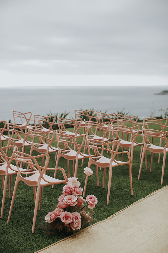 Gorgeous pink roses for wedding aisle