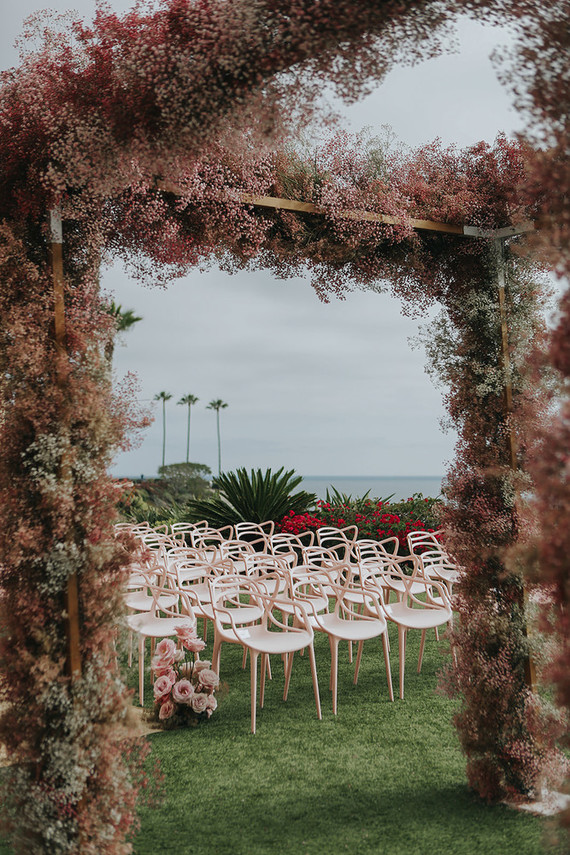 Pink babies breath wedding arch Inspiration