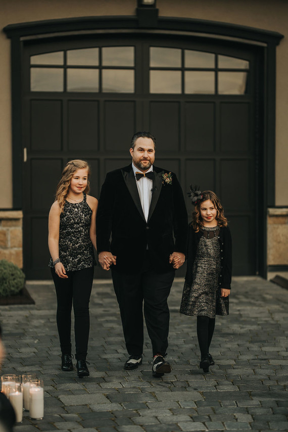 Groom with children