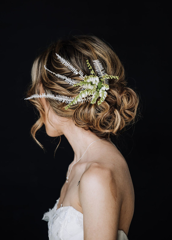 Bridal updo with greenery