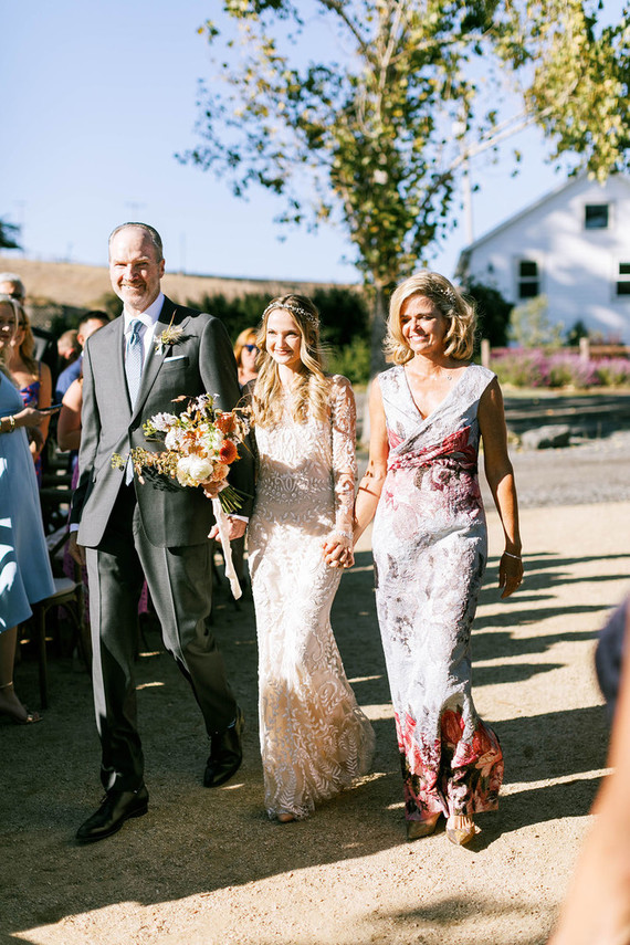 walking down the aisle with both parents