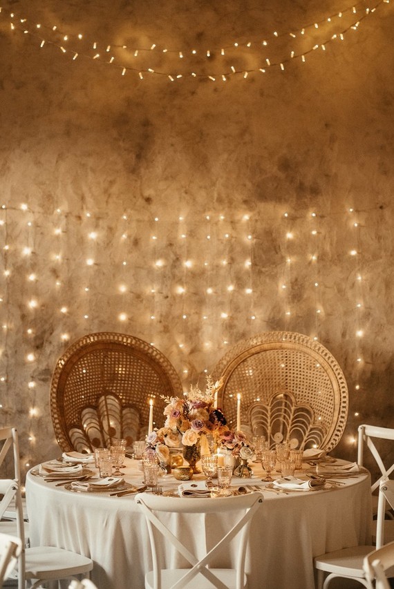 sweetheart table with lighting backdrop