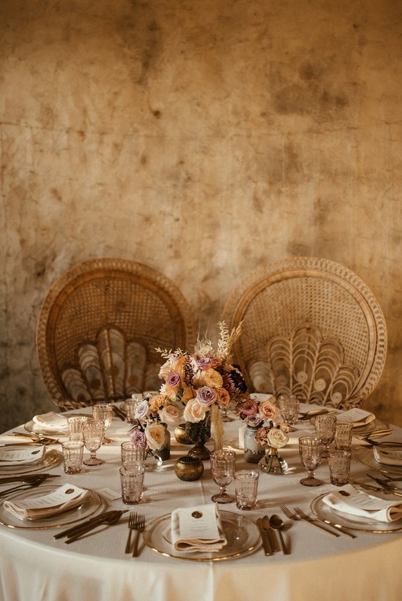 Sweetheart table with peacock chairs