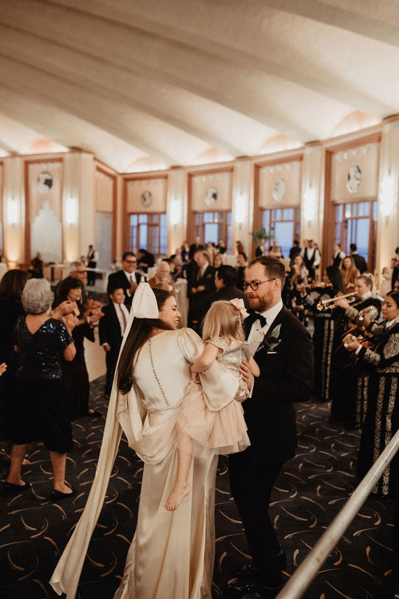 bow hairpiece with reception dress