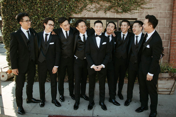 groomsmen in all black