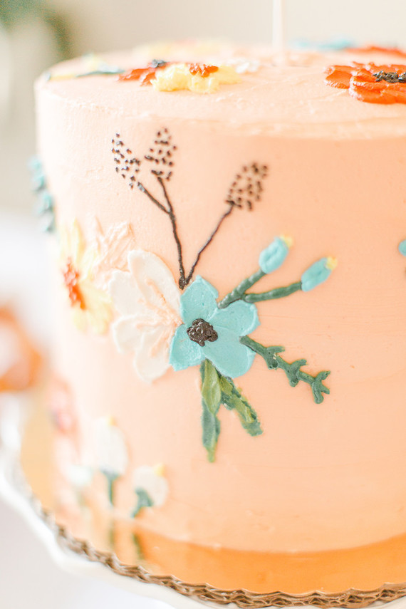 floral peach 1st birthday cake