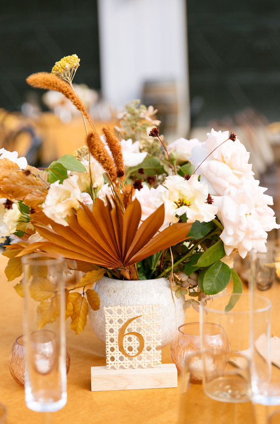 cream and rust wedding centerpiece