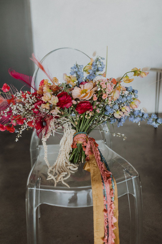 colorful bridal bouquet with feathers