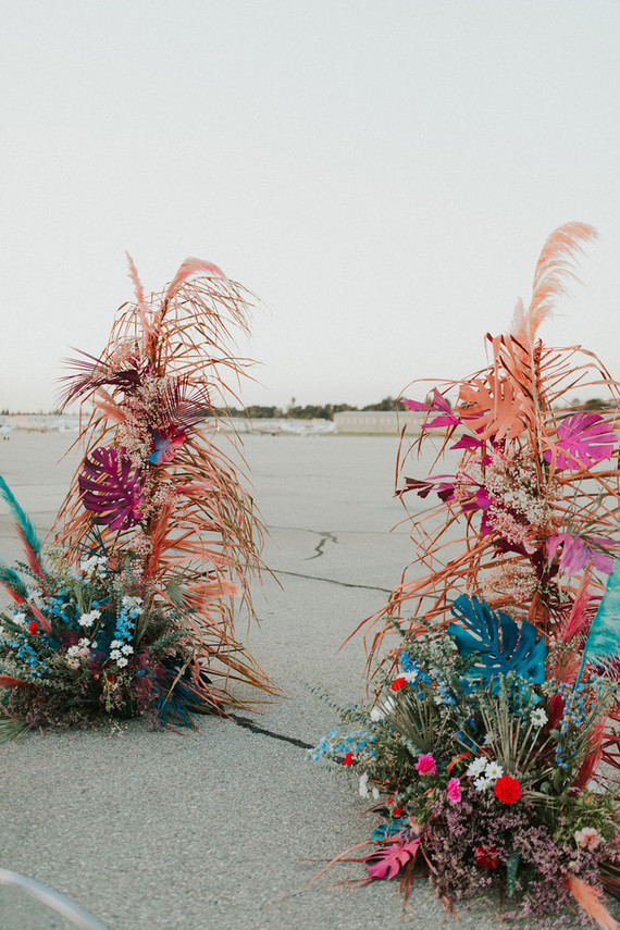 colorful ceremony flowers with feathers