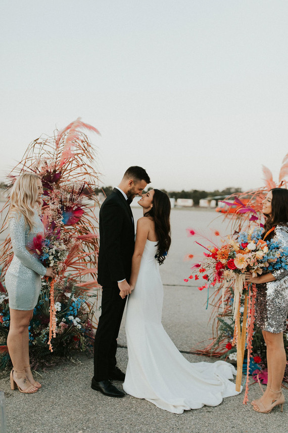 colorful ceremony flowers with feathers Inspiration