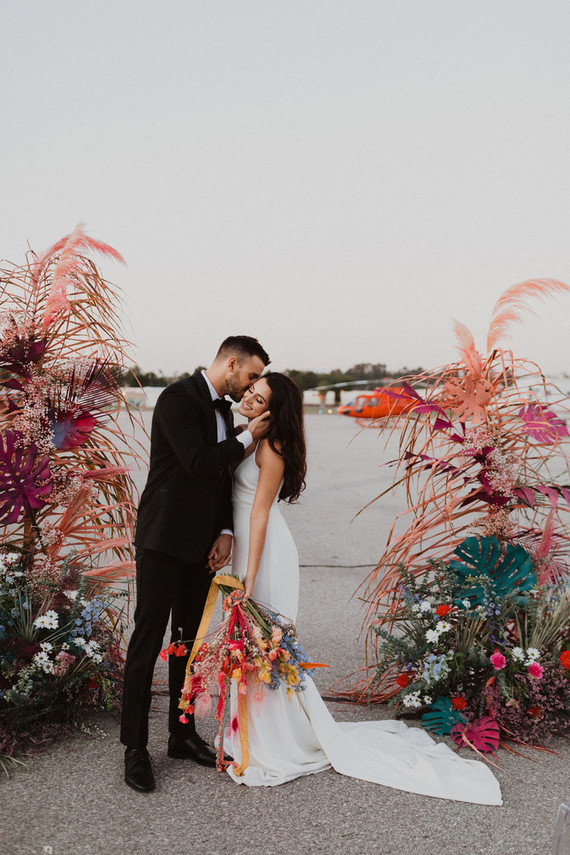 colorful ceremony flowers with feathers
