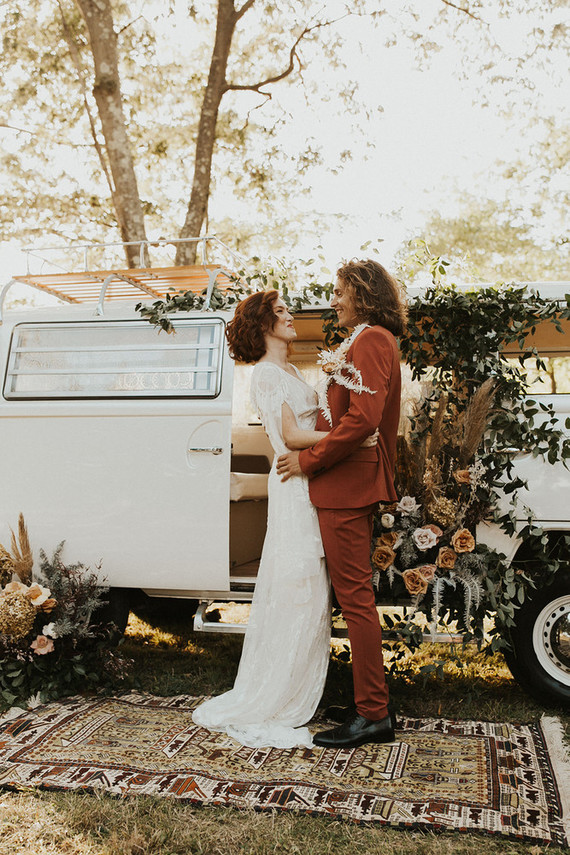 rust colored groom's suit