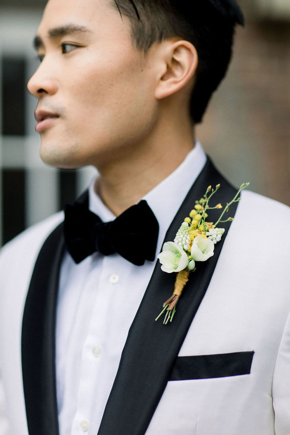 white tux with yellow boutonniere Inspiration