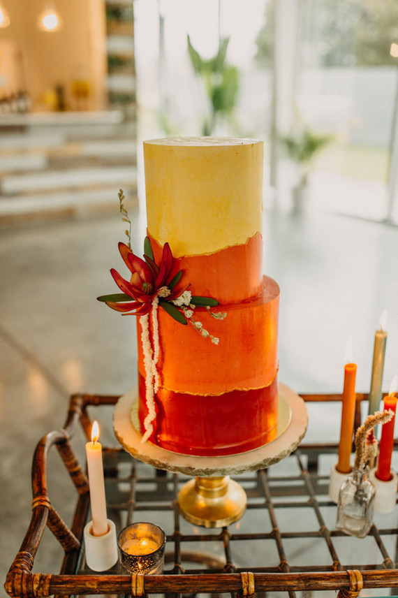 orange wedding cake for desert inspired wedding