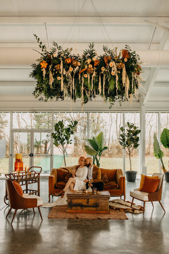 lush modern boho wedding floral installation