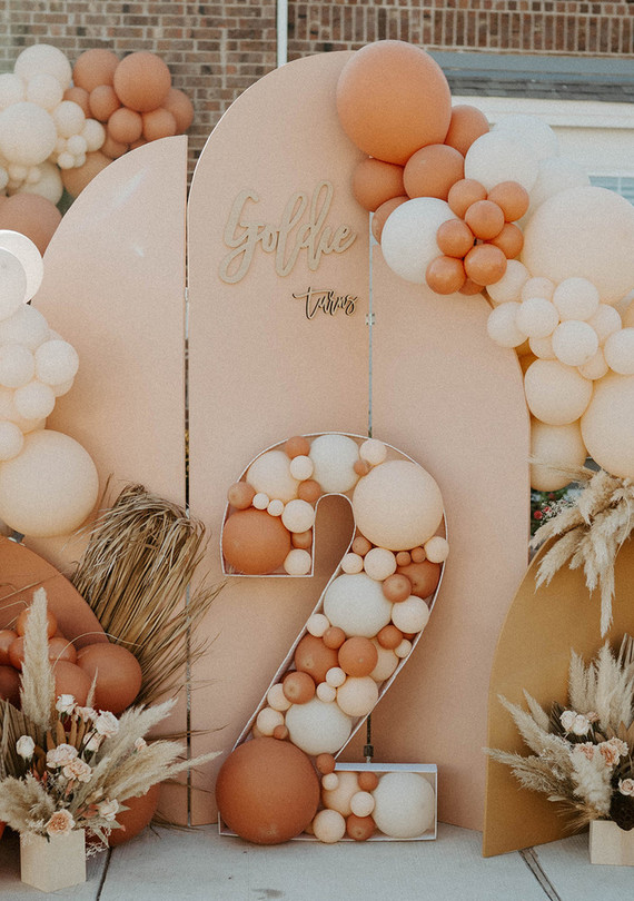 Boho blushy second birthday drive through party