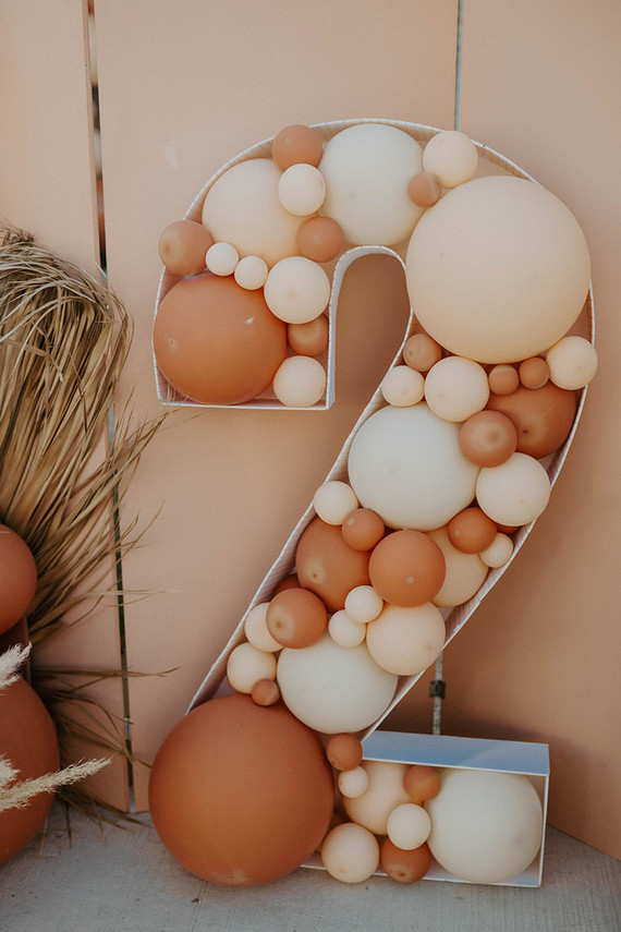 Boho blushy second birthday drive through party