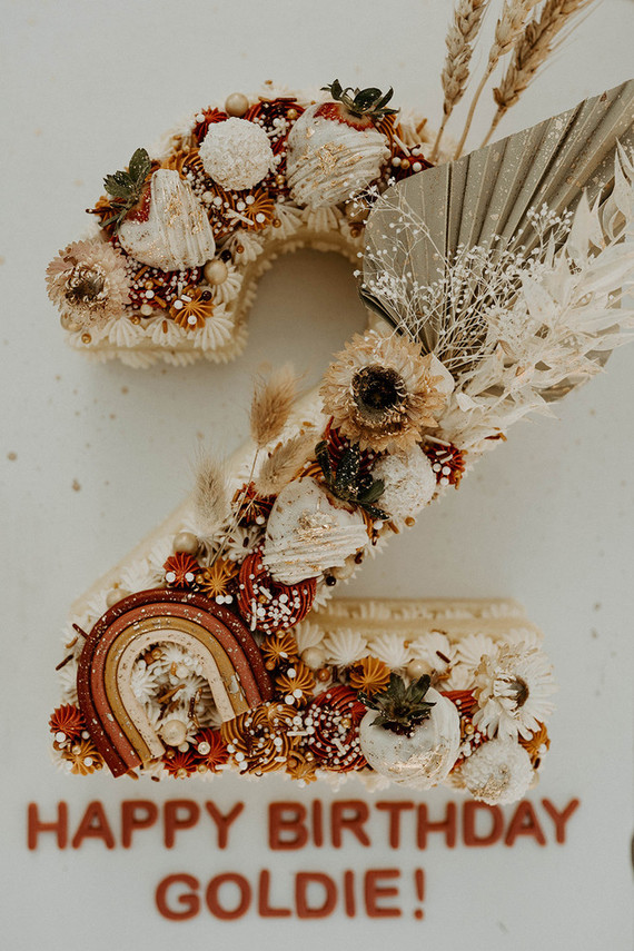 Boho blushy second birthday drive through party