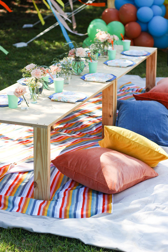 Groovy rainbow themed second birthday party