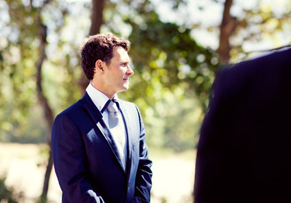 Dapper blue suited groom