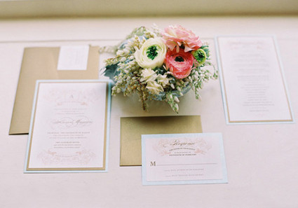 Elegant gold envelopes and invitations