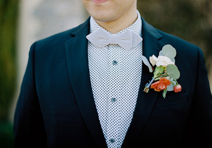 Colorful boutonniere and bow tie