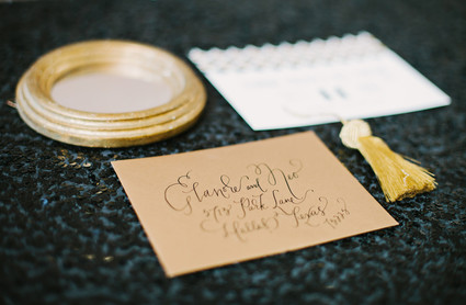 Black and gold escort cards
