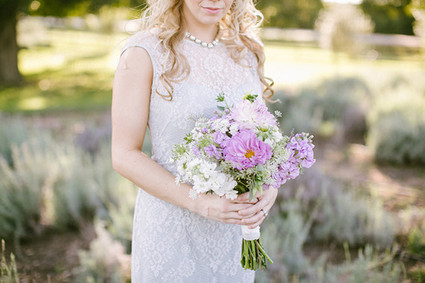 Lavender farm wedding inspired bride with purple bouquet