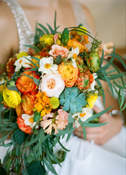 Ranunculus rose and succulent bouquet