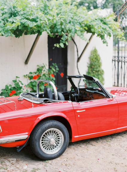 Red wedding getaway car