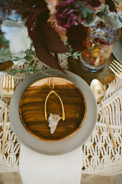 Bohemian New Years brunch place setting with gold wish bone