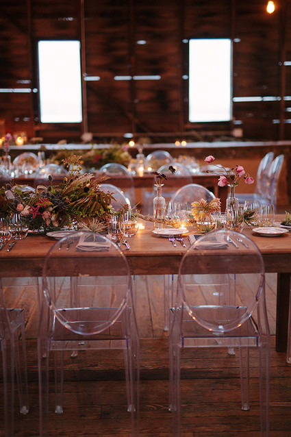 Wooden tablescape with clear chairs Inspiration