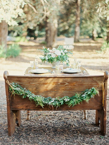 Wooden tablescape with garland