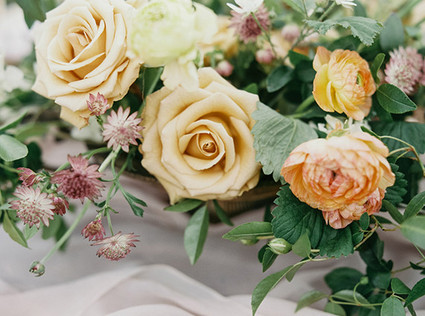 Rose and ranunculus floral centerpiece