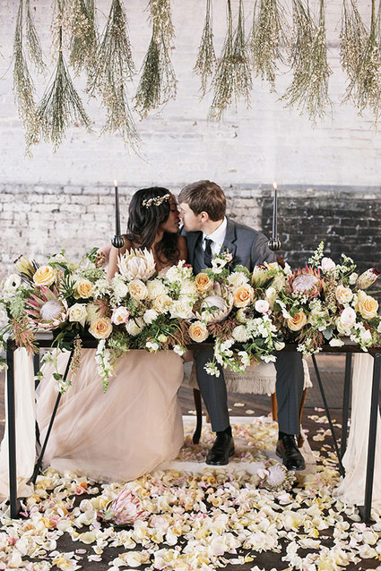 Industrial Wedding Sweetheart Table Protea Decor