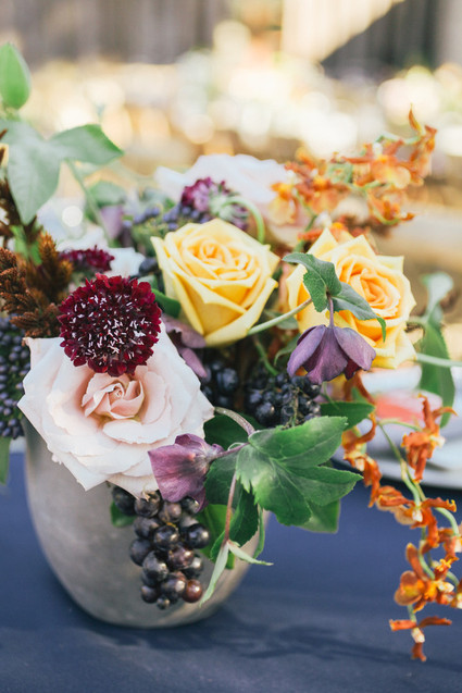 Grape and rose floral arrangement