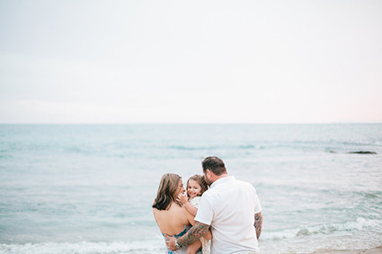 Beach maternity photos by Megan Welker