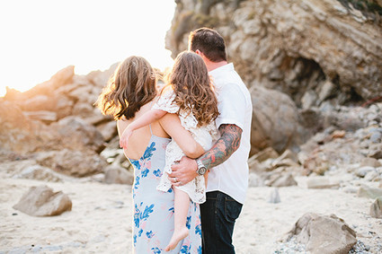 Beach maternity photos by Megan Welker
