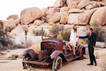 Bohemian desert portrait with vintage car