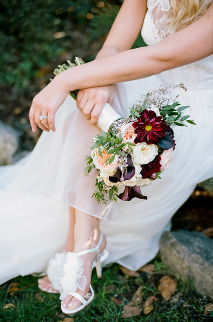 Plum bouquet and white shoes