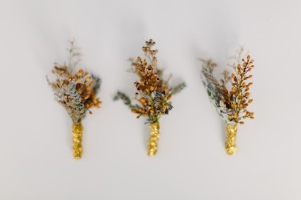 Yellow and gold Boutonnieres