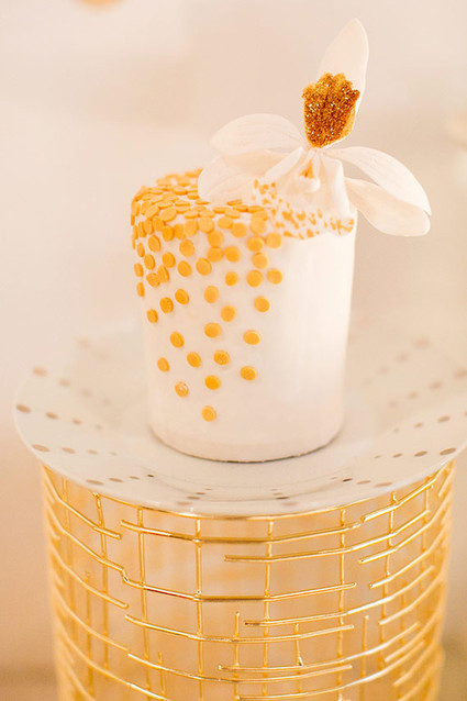Gold cake with floral topper