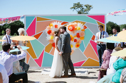 Modern Mexican wedding kissing portrait