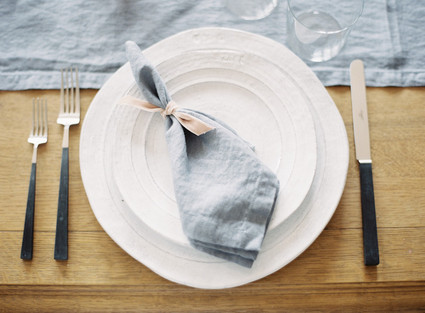 Intimate blue & metallic wedding place setting