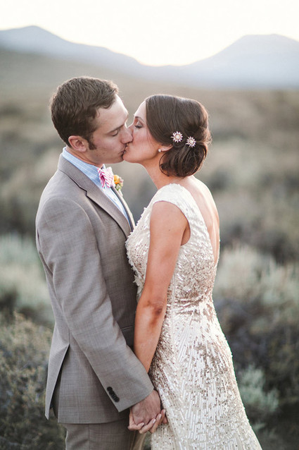 Outdoor wedding kissing photo