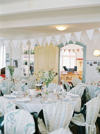 White and light blue wedding tablescape