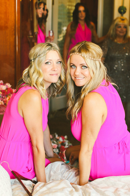 Bridesmaids in bright pink dresses