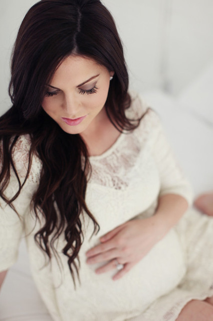 Floral studio maternity photos by Tracy Layne