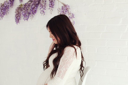 Floral studio maternity photos by Tracy Layne