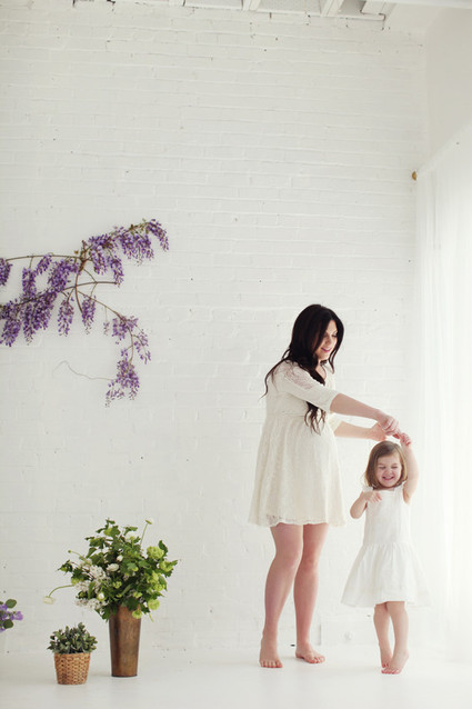 Floral studio maternity photos by Tracy Layne